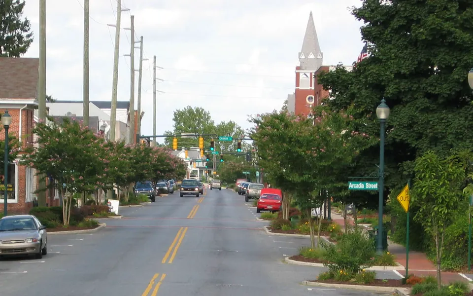 High Street in Seaford, Delaware, lined with trees and green lamp posts